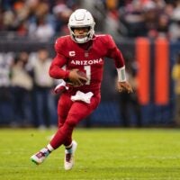Dec 24, 2023; Chicago, Illinois, USA; Arizona Cardinals quarterback Kyler Murray (1) runs with the ball against the Chicago Bears at Soldier Field.