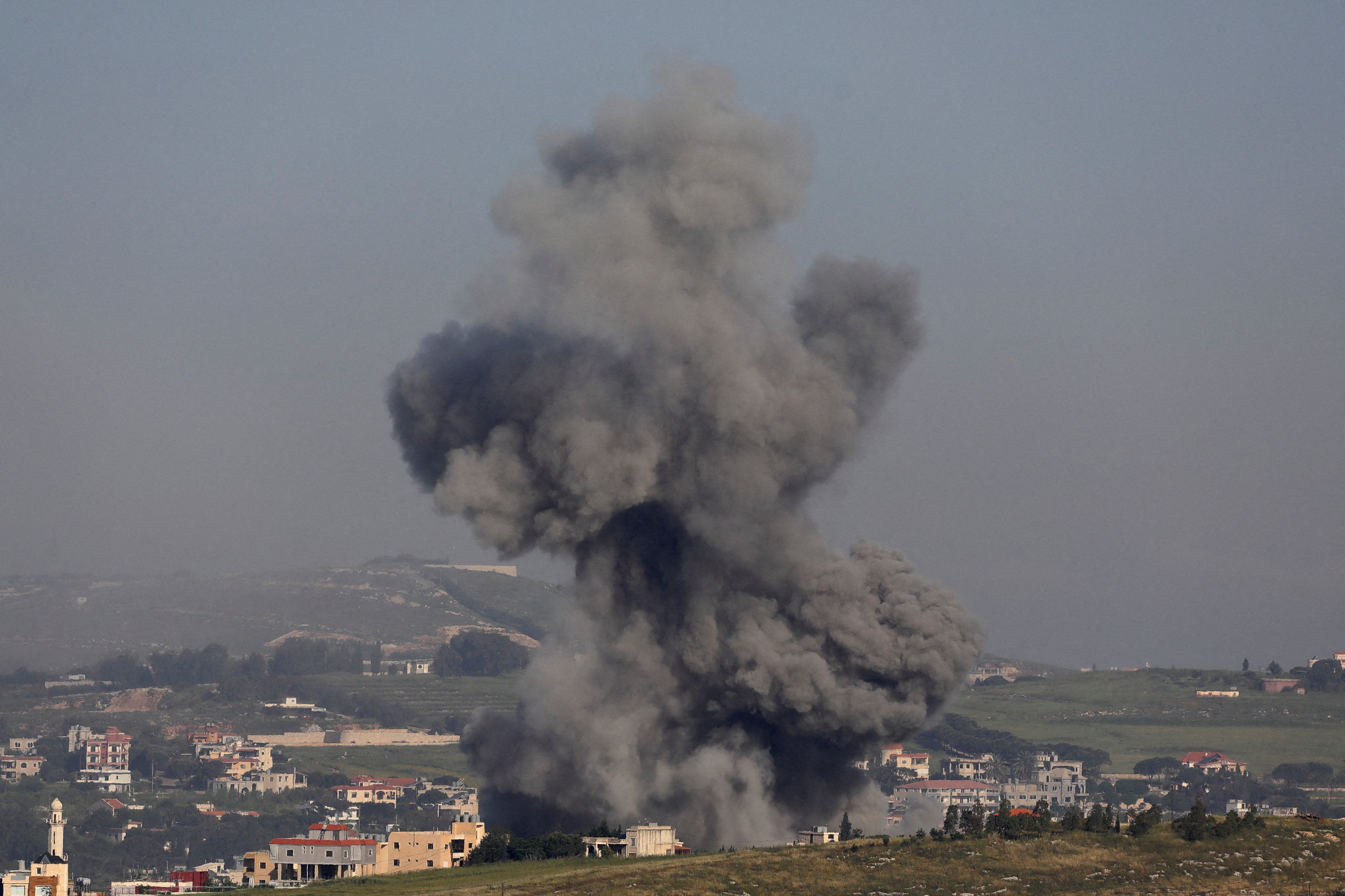 Smoke rises following an Israeli strike in southern Lebanon as seen from Marjayoun, May 11