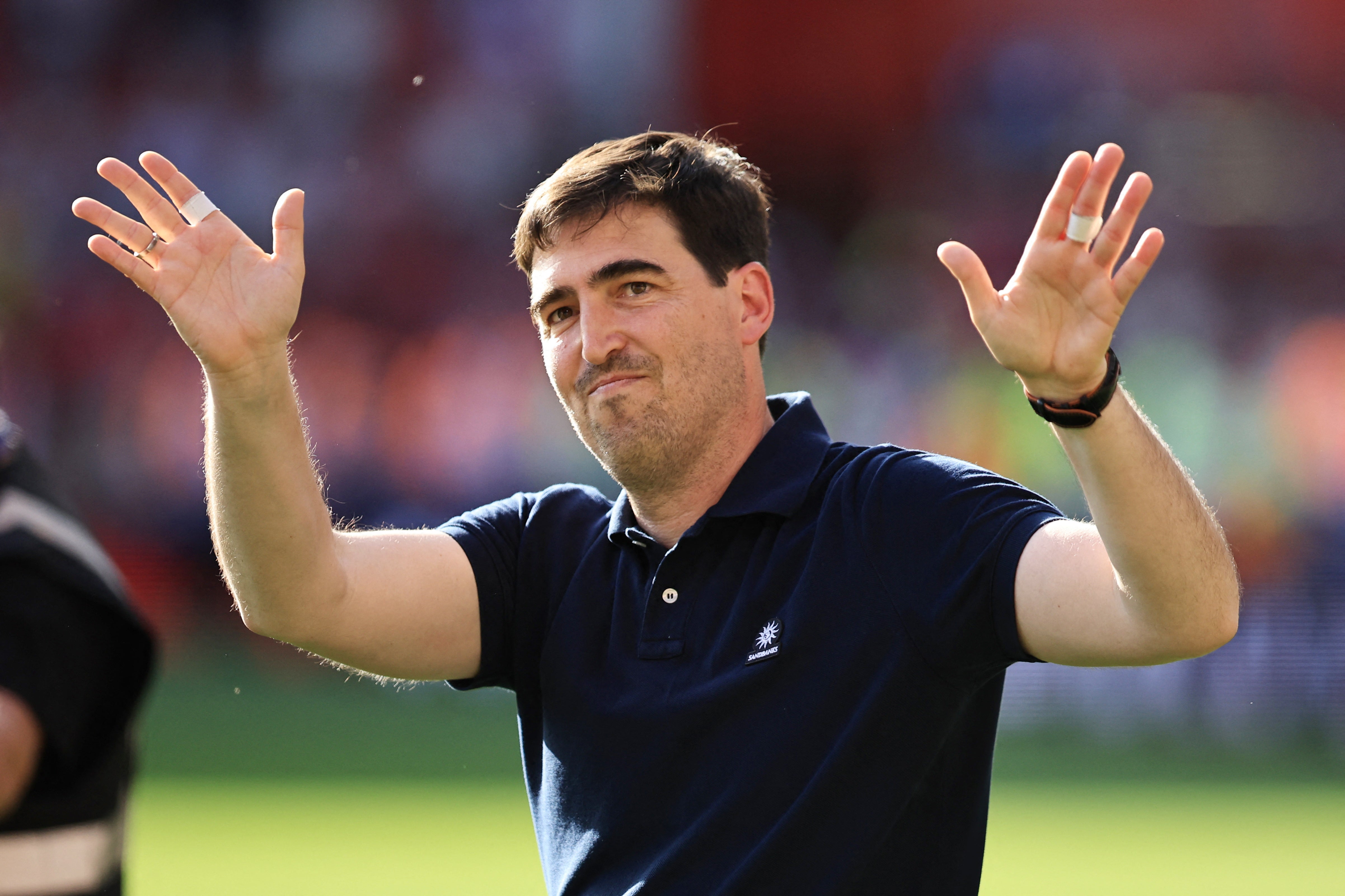 Bournemouth manager Andoni Iraola salutes their fans after his last match for the club