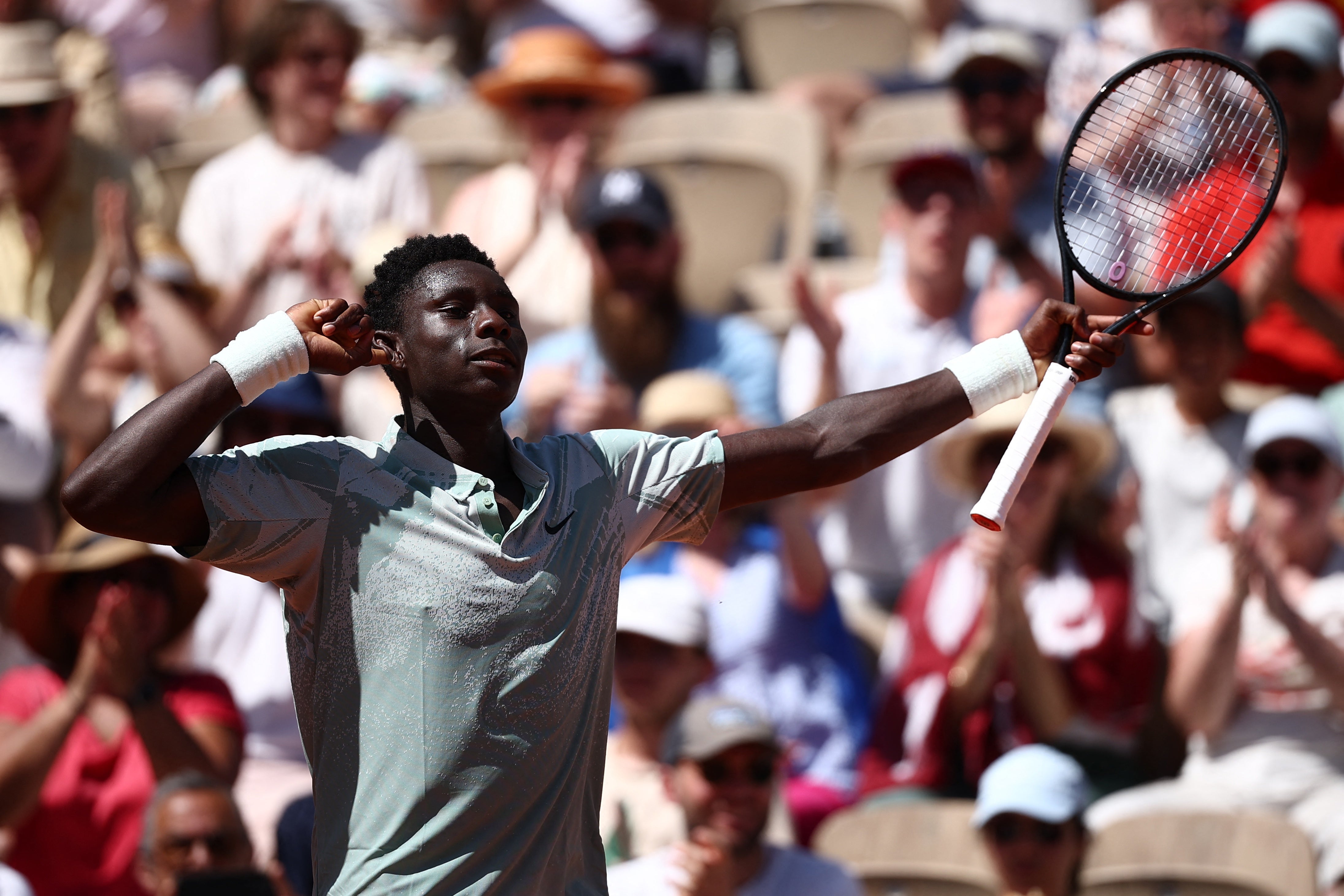 Kouame triumphed in the blazing Paris heat, beating Cilic in straight sets to reach the second round
