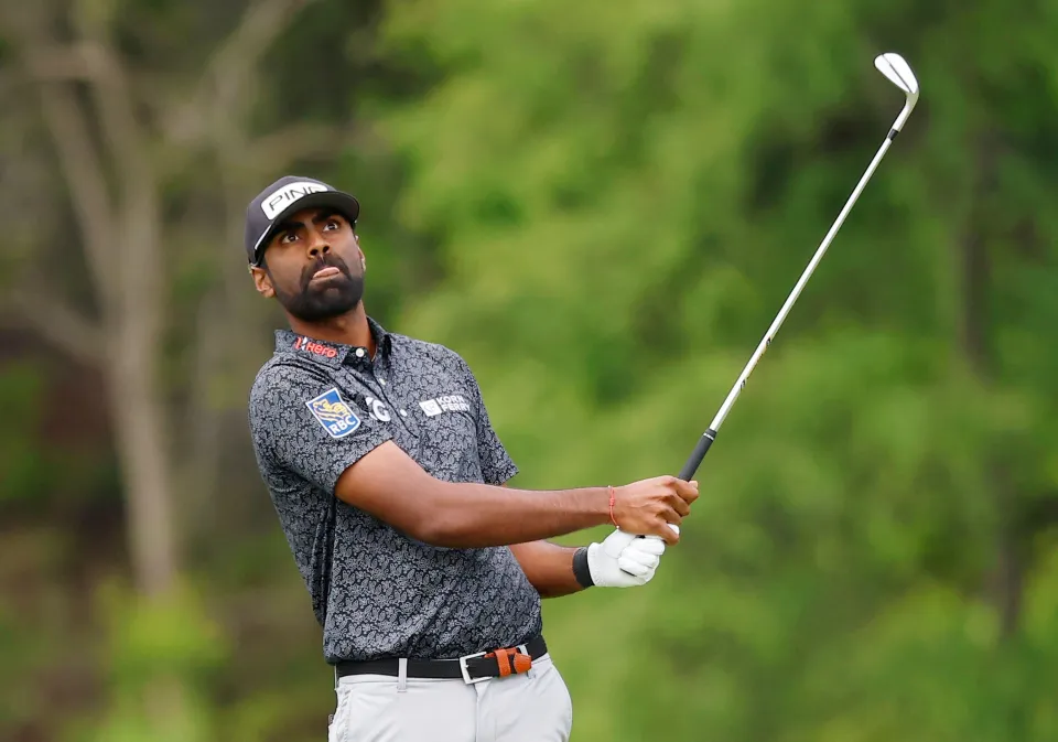 Sahith Theegala hits an approach shot on the 1st fairway during the second round of the 2026 PGA Championship at Aronimink Golf Club