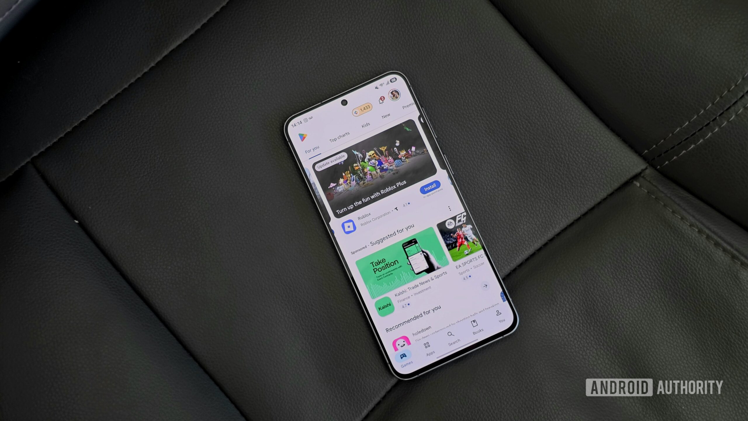 Samsung Galaxy A57 review image 14 Samsung Galaxy A57 review image showing the phone placed on a grey surface