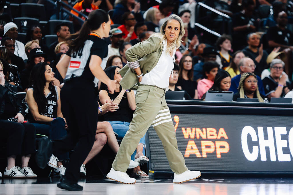 Aces head coach Becky Hammon speaks to a referee during the Aces’ season opener and cham ...