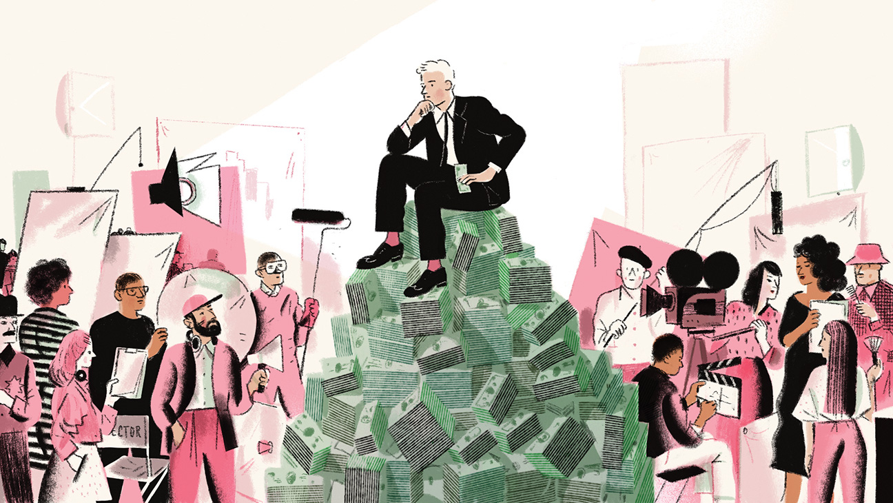 A man in a suit sitting atop a pile of cash, surrounded by cast and crew of a film production