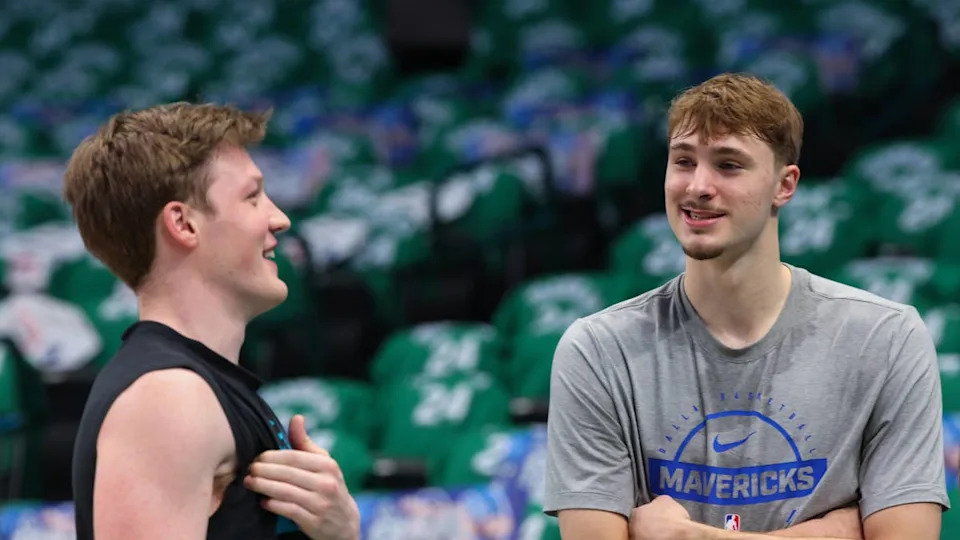 Dallas Mavericks forward <a class="link " href="https://sports.yahoo.com/nba/players/10468/" data-i13n="sec:content-canvas;subsec:anchor_text;elm:context_link" data-ylk="slk:Cooper Flagg;sec:content-canvas;subsec:anchor_text;elm:context_link;itc:0" data-yga="{"yLinkElement":"context_link","yModuleName":"content-canvas","yLinkText":"Cooper Flagg","ySubModuleName":"anchor_text","yHasCommerce":false}">Cooper Flagg</a> (right) speaks with <a class="link " href="https://sports.yahoo.com/nba/teams/charlotte/" data-i13n="sec:content-canvas;subsec:anchor_text;elm:context_link" data-ylk="slk:Charlotte Hornets;sec:content-canvas;subsec:anchor_text;elm:context_link;itc:0" data-yga="{"yLinkElement":"context_link","yModuleName":"content-canvas","yLinkText":"Charlotte Hornets","ySubModuleName":"anchor_text","yHasCommerce":false}">Charlotte Hornets</a> guard <a class="link " href="https://sports.yahoo.com/nba/players/10450/" data-i13n="sec:content-canvas;subsec:anchor_text;elm:context_link" data-ylk="slk:Kon Knueppel;sec:content-canvas;subsec:anchor_text;elm:context_link;itc:0" data-yga="{"yLinkElement":"context_link","yModuleName":"content-canvas","yLinkText":"Kon Knueppel","ySubModuleName":"anchor_text","yHasCommerce":false}">Kon Knueppel</a> (left)© Kevin Jairaj-Imagn Images