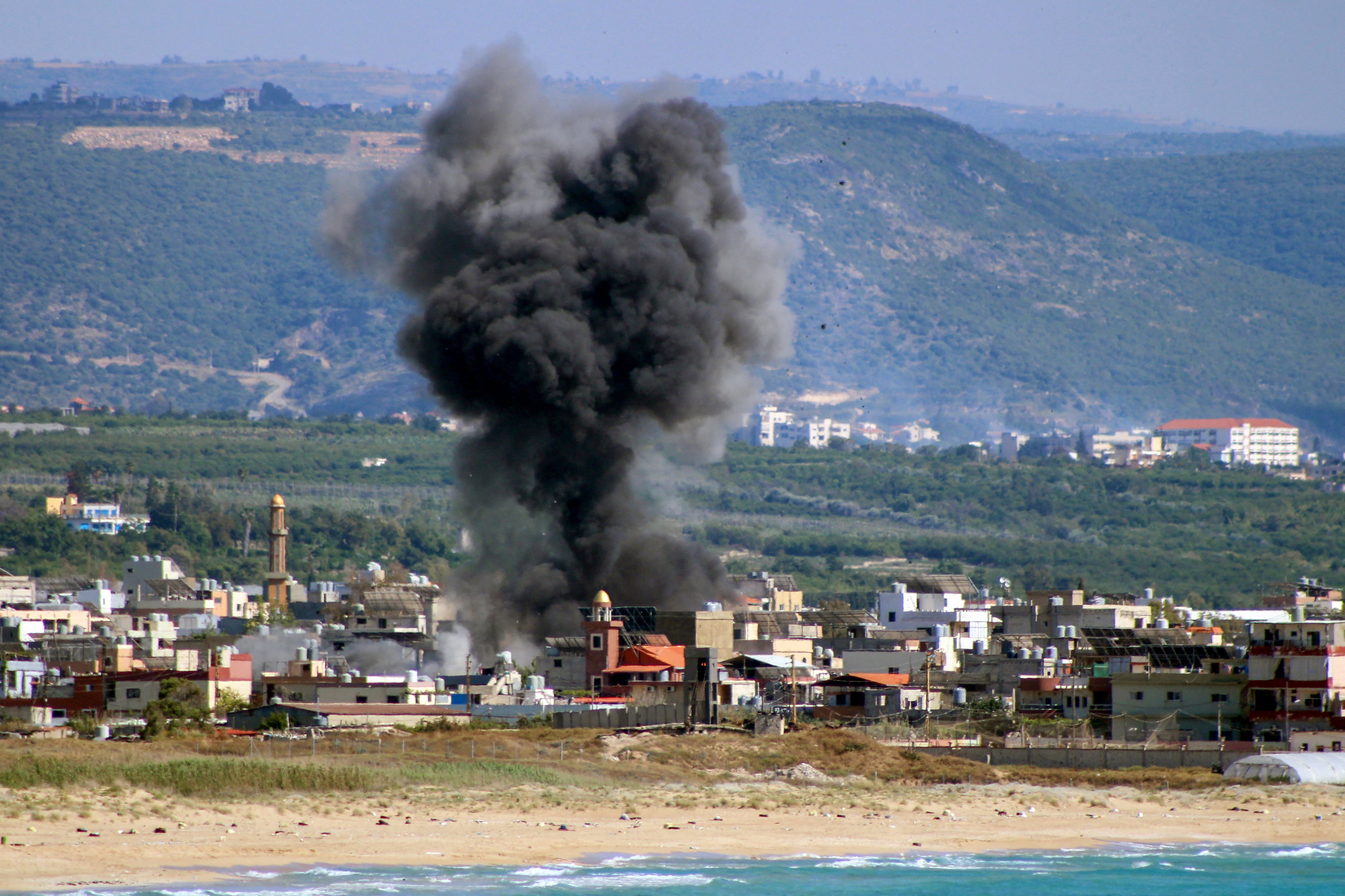 Smoke rises following an Israeli airstrike on the Rashidieh Palestinian refugee camp in the Tyre district of southern Lebanon