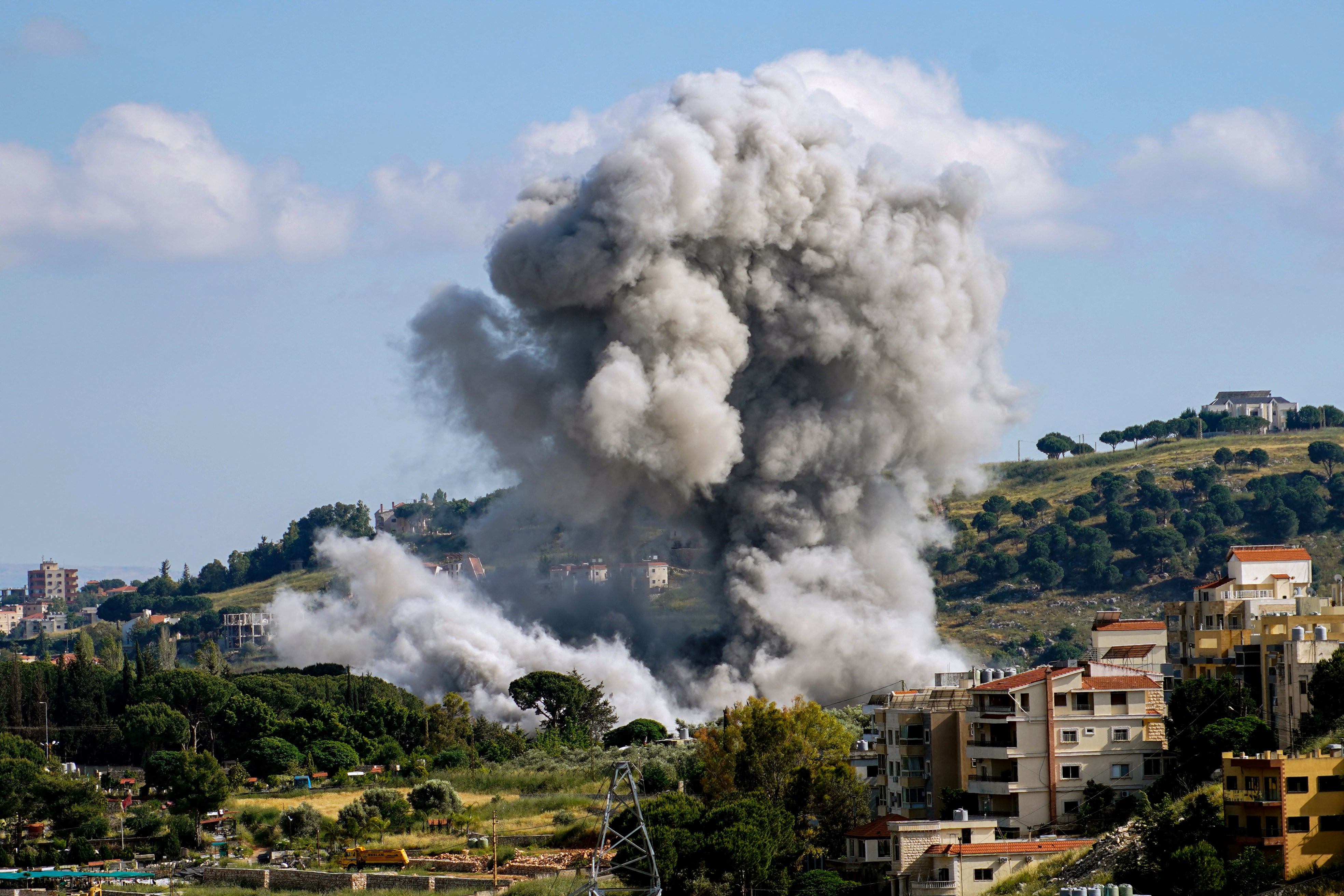 Smoke rises following an Israeli airstrike that targeted the southern Lebanese village of Nabatieh