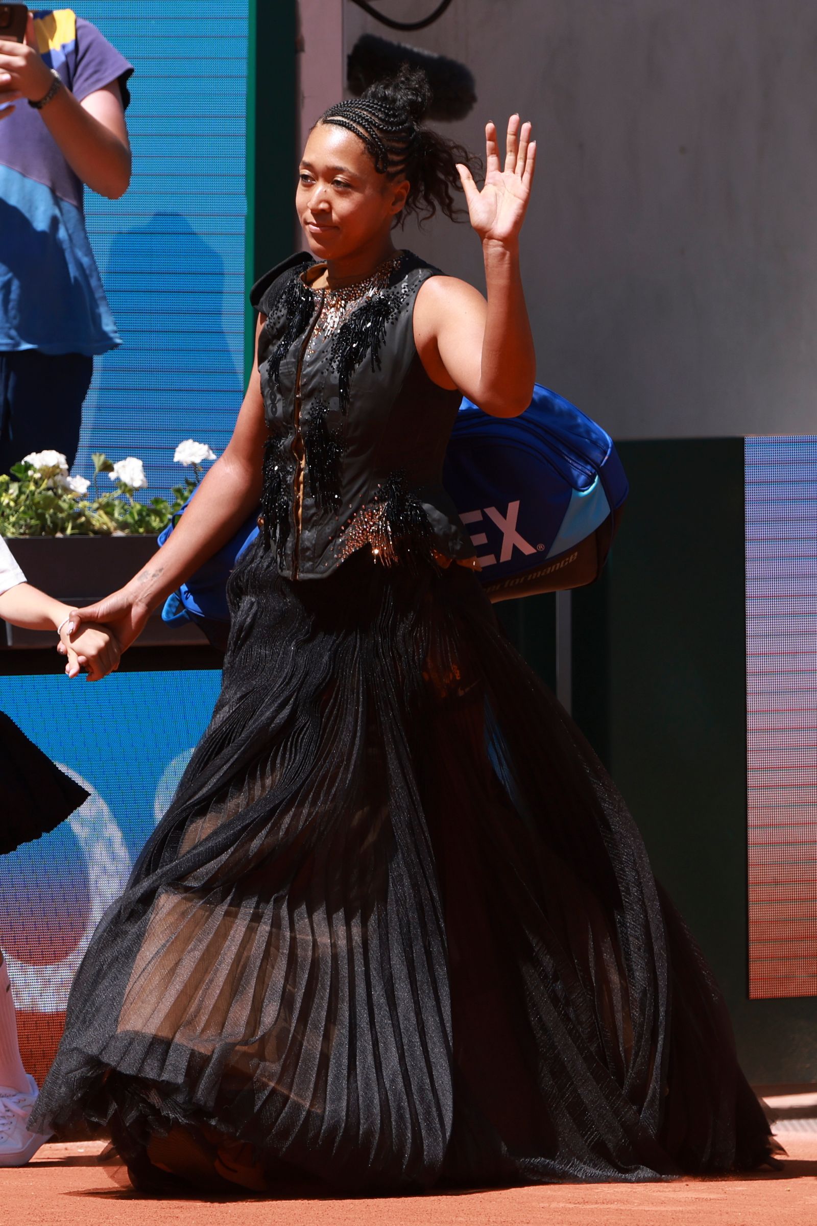 Image may contain Naomi Osaka Adult Person Dancing Leisure Activities Performer and Solo Performance