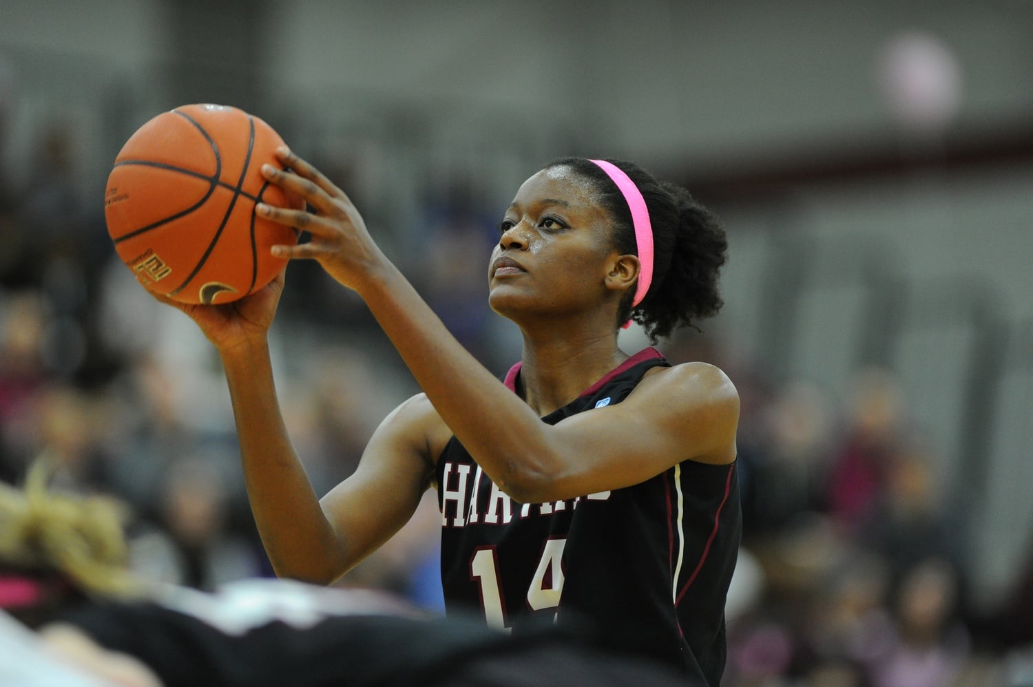 Temi Fagbenle ’15 shoots a free throw for Harvard. 