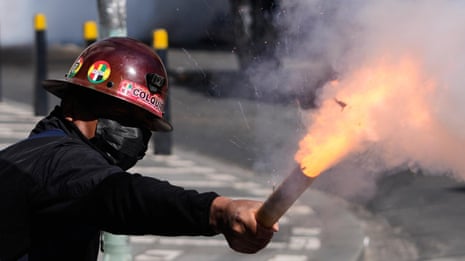 Protesters and police clash in La Paz as Bolivia’s anti-government unrest escalates – video