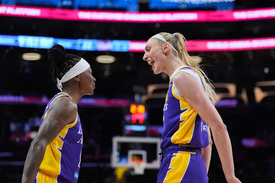 Cameron Brink #22 of the Los Angeles Sparks reacts with teammate Erica Wheeler after blocking the shot of Caitlin Clark #22 of the Indiana Fever during the game on May 13, 2026 at Crypto.com Arena in Los Angeles, California. AP