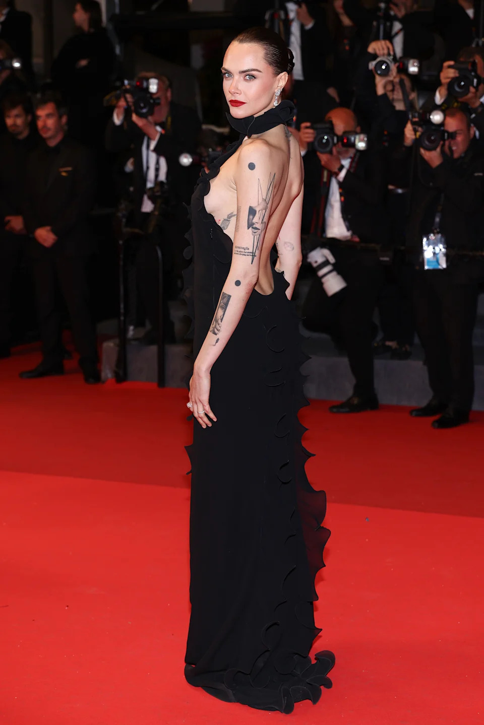 Cara Delevingne on the red carpet.