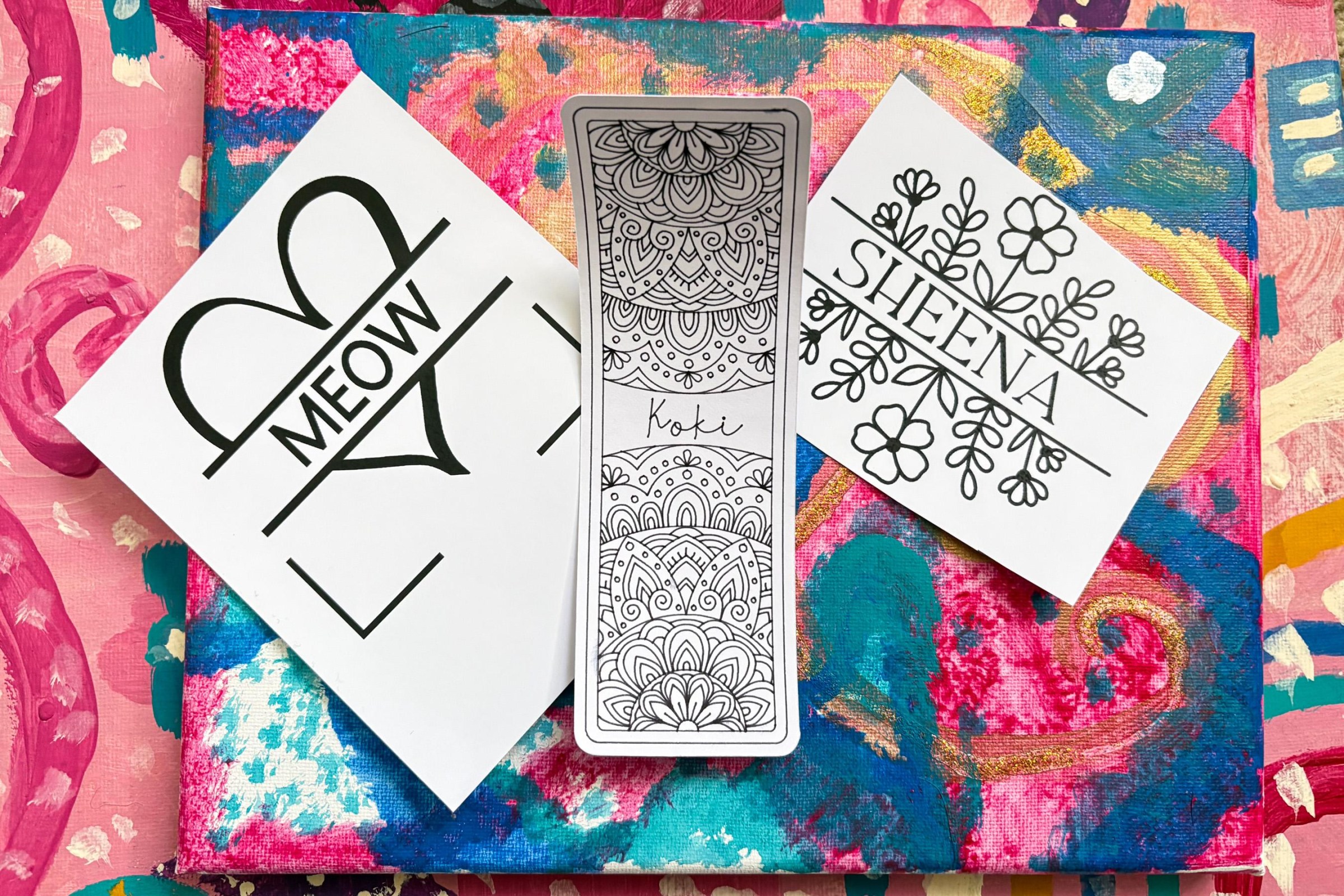 I made both personalized stickers and bookmarks and eventually got back into a creative flow. I even painted the canvases underneath.