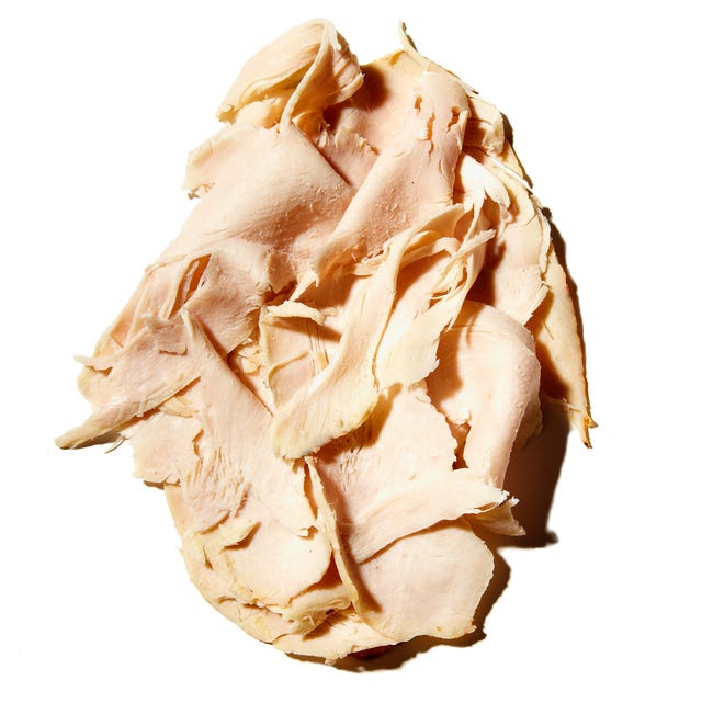 Turkey cold cuts Shredded pieces of chicken on a white background