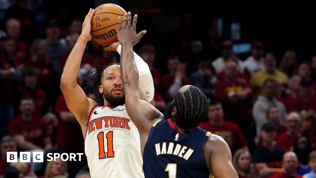 The New York Knicks' Jalen Brunson shoots the ball as he is challenged by the Cleveland Cavaliers' James Harden