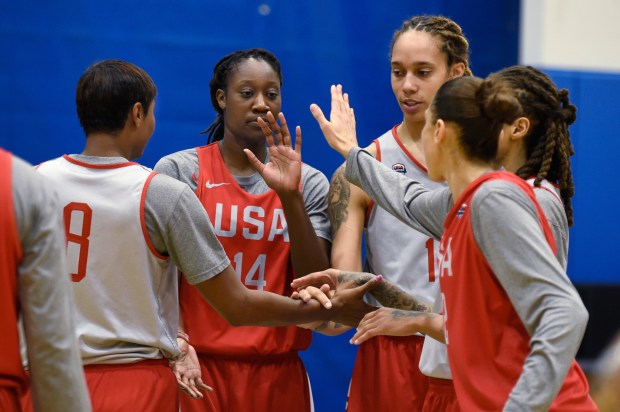 Team USA's Angel McCoughtry, Tina Charles, Brittney Griner, Seimone Augustus and Diana Taurasi (l-r) high five after a drill during a Team USA practice at the MSG Training Center Saturday. Team USA will play Team Australia at Madison Square Garden in exhibition play on Sunday.