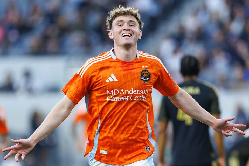 Jack McGlynn #8 of Houston Dynamo FC celebrates after scoring a goal during an MLS match against LAFC on May 10, 2026 at BMO Stadium in Los Angeles, California.