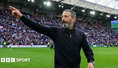 Hearts fans and players celebrate at full-time