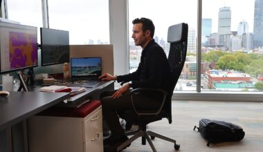 Andy Beck, Chief Executive Officer and Co-founder of PathAI, works at his desk in his office overlooking Boston.
