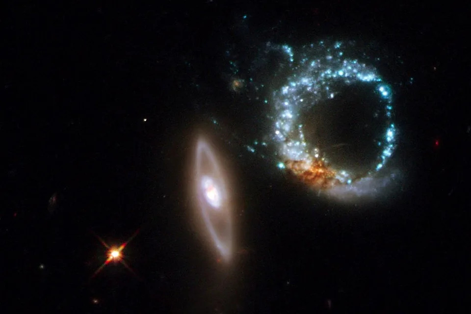 A pair of gravitationally interacting galaxies called Arp 147, photographed on October 27-28, 2008Credit: LIVIO/NASA-ESA/AFP via Getty