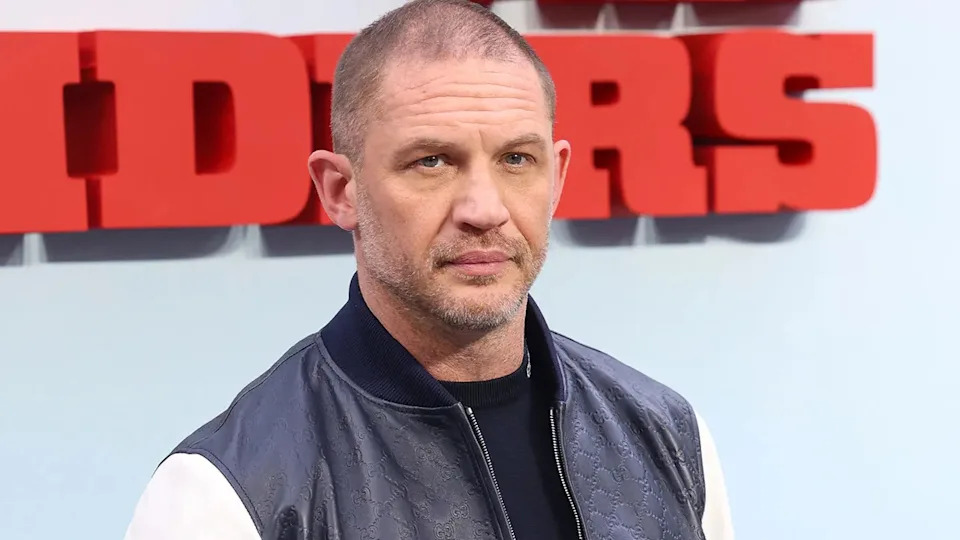 Tom Hardy standing at the London Gala Screening of The Bikeriders at The Curzon Mayfair.