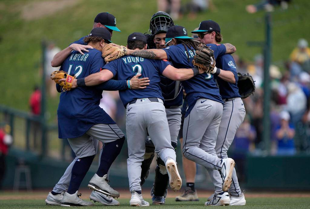The Seattle Mariners celebrate after defeating the Athletics 9-1 at Sutter Health Park on Wednesday, May 27, 2026, in West Sacramento, California. (Thearon W. Henderson / Getty Images/ Tribune News Services)