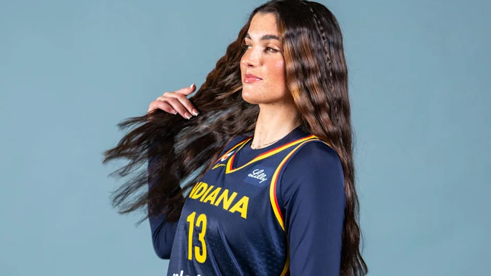 Indiana Fever forward Justine Pissott (13) poses for a photo during media day.© Grace Smith/IndyStar via Imagn Images