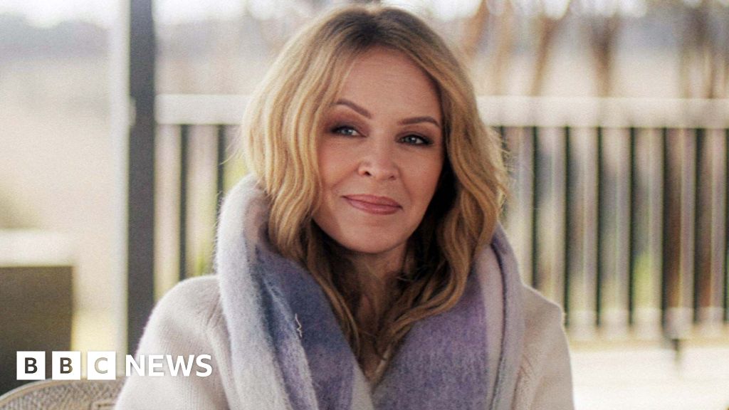Kylie Minogue reveals she had second cancer diagnosis in 2021 - BBC