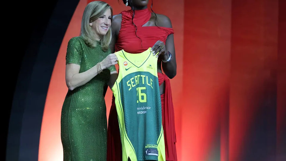 WNBA Commissioner Cathy Engelbert (left) poses for photos with Awa FamBrad Penner-Imagn Images