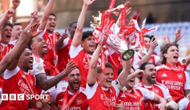 A graphic of Premier League players from every team in the division in 2025-26 season, with the Premier League trophy in front of them.