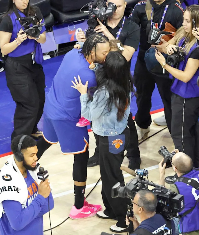 Knicks guard Jalen Brunson (11) kisses his wife Ali Brunson at the end of the <br>May 10 game.<br> Jason Szenes for the New York Post
