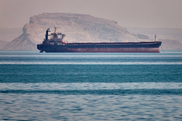 A bulk cargo ship sits at anchor in the Strait of Hormuz off Bandar Abbas, Iran, Saturday, May 2, 2026.(Amirhosein Khorgooi/ISNA via AP)