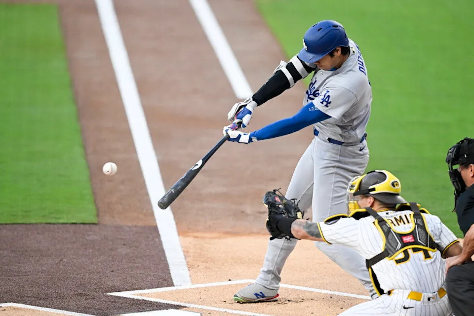 May 19, 2026; San Diego, California, USA; Los Angeles Dodgers designated hitter Shohei Ohtani (17) hits a single during the first inning against the San Diego Padres at Petco Park. Mandatory Credit: Denis Poroy-Imagn Images