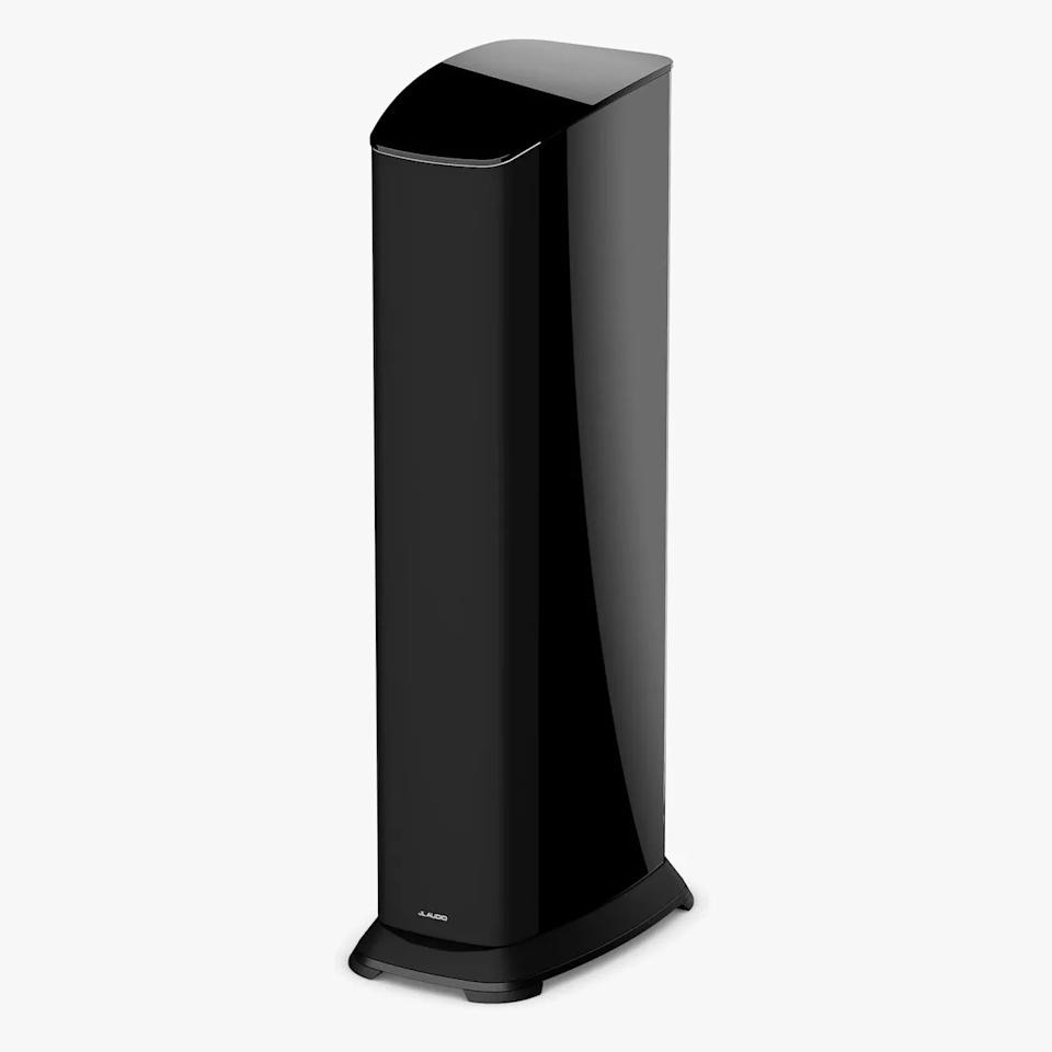 Tall black glossy floor-standing speaker with curved top and base on a white background.