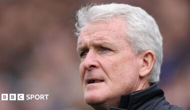 Mark Hughes looks concerned on the sidelines during Carlisle's play-off semi-final defeat by Boreham Wood