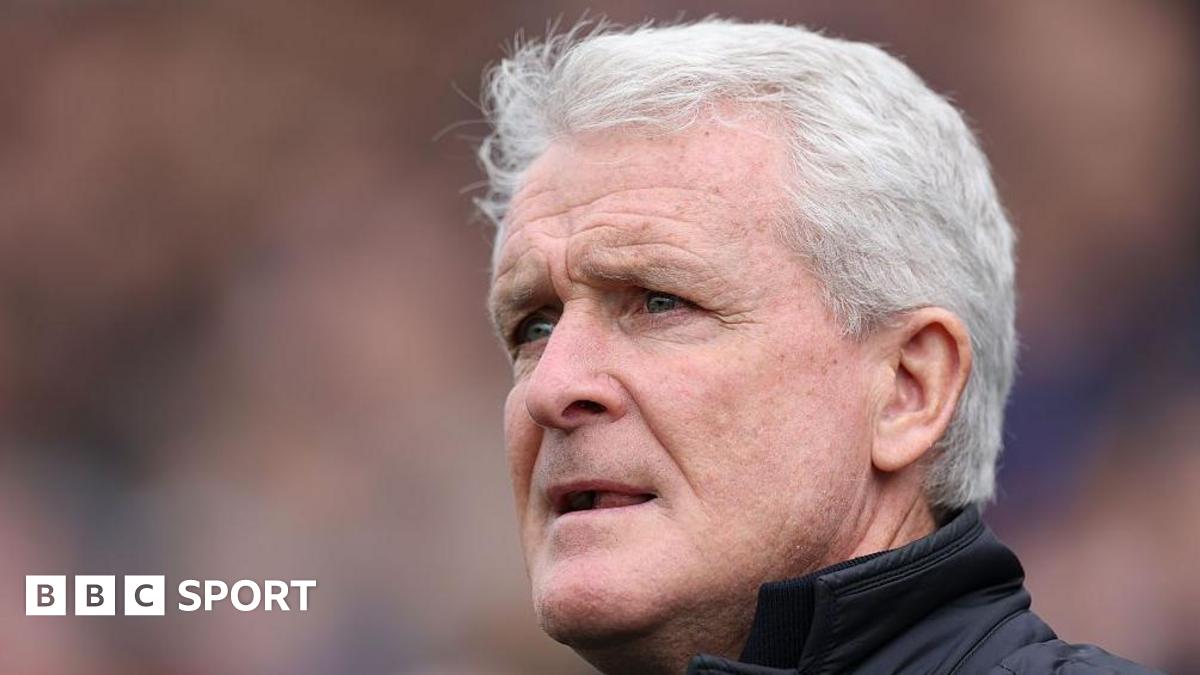 Mark Hughes looks concerned on the sidelines during Carlisle's play-off semi-final defeat by Boreham Wood