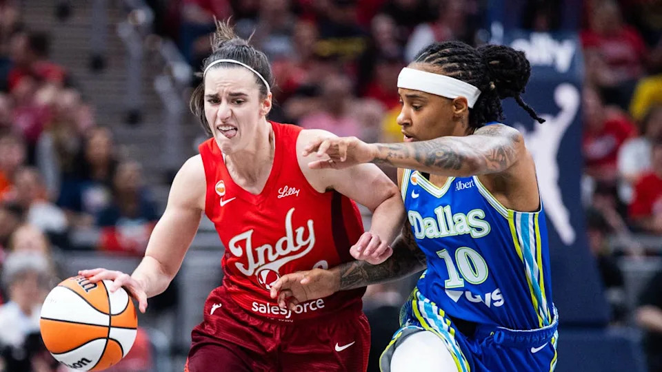 Indiana Fever guard Caitlin Clark (22) dribbles the ball while Dallas Wings guard <a class="link " href="https://sports.yahoo.com/wnba/players/10221/" data-i13n="sec:content-canvas;subsec:anchor_text;elm:context_link" data-ylk="slk:Aziaha James;sec:content-canvas;subsec:anchor_text;elm:context_link;itc:0" data-yga="{"yLinkElement":"context_link","yModuleName":"content-canvas","yLinkText":"Aziaha James","ySubModuleName":"anchor_text","yHasCommerce":false}">Aziaha James</a> (10) defends.Trevor Ruszkowski-Imagn Images