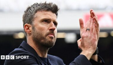Manchester United caretaker head coach Michael Carrick applauds supporters after victory over Liverpool