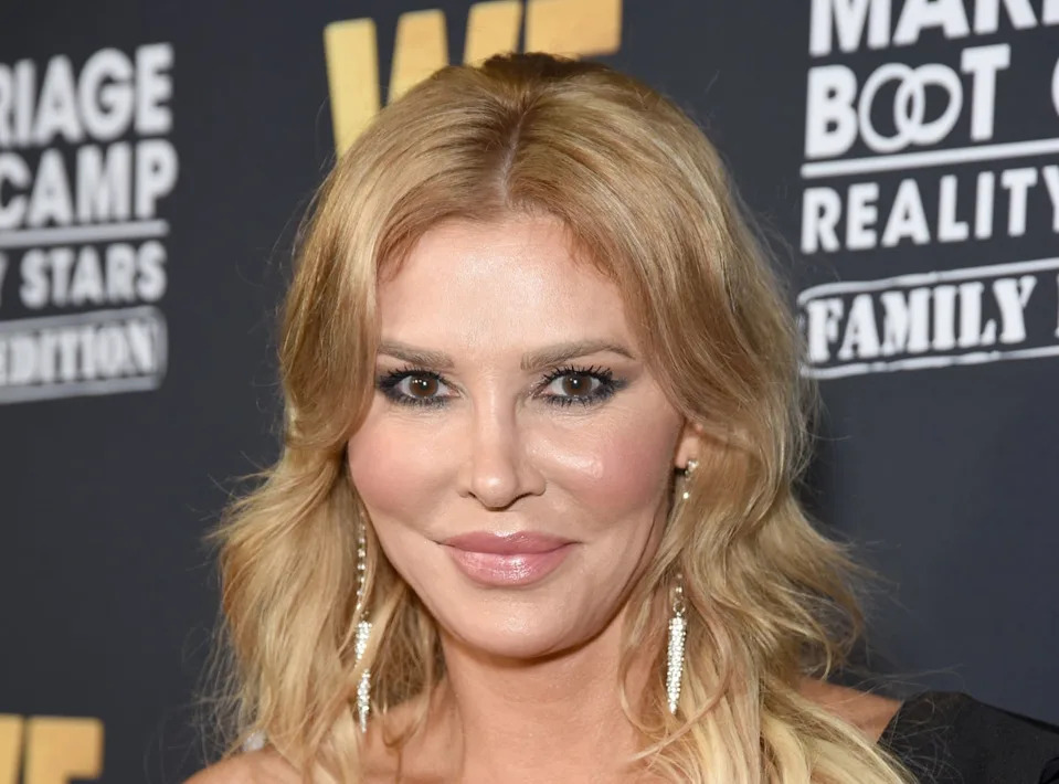 Brandi Glanville recently discovered that her facial disfiguration was caused by a parasite that developed from ruptured breast implants (Getty Images for WE tv)