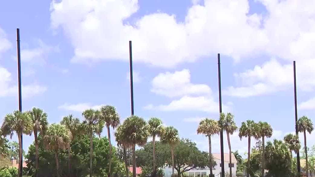 Collier County community residents fight golf poles built without permits near homes