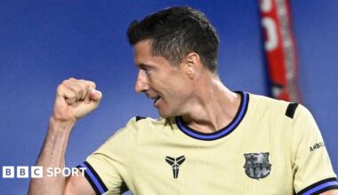 Robert Lewandowski points in celebration