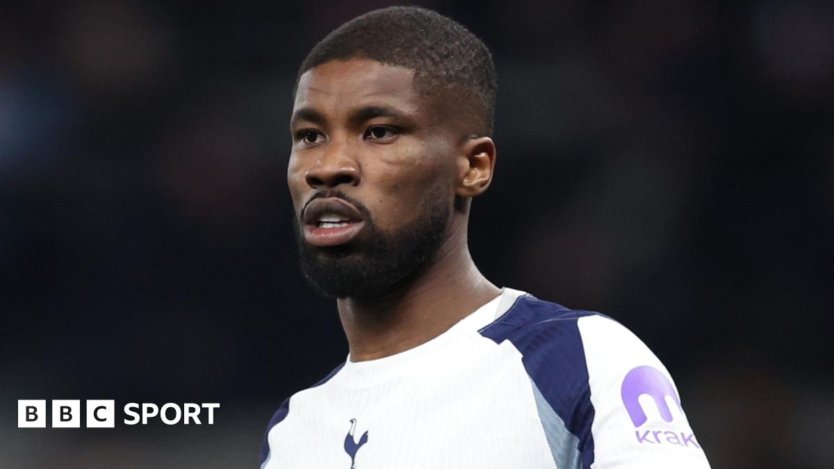 Kevin Danso looks on while playing for Tottenham