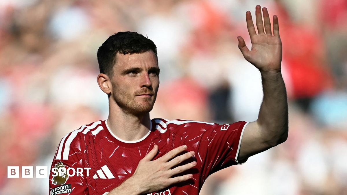 Andy Robertson waves to Liverpool fans after final match at Anfield