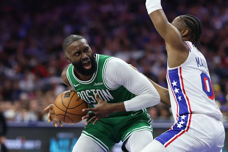 Apr 30, 2026; Philadelphia, Pennsylvania, USA; Boston Celtics guard Jaylen Brown (7) drives against Philadelphia 76ers guard Tyrese Maxey (0) during the second quarter at Xfinity Mobile Arena. Mandatory Credit: Bill Streicher-Imagn Images