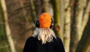 A woman listening to headphones