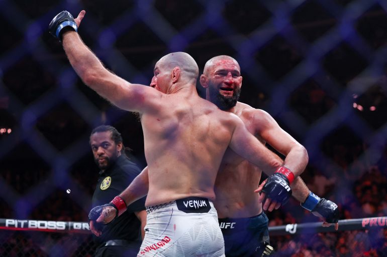 NEWARK, NEW JERSEY - MAY 09: Khamzat Chimaev of the United Arab Emirates and Sean Strickland of the United States hug after their middleweight title bout during UFC 328 at the Prudential Center on May 09, 2026 in Newark, New Jersey. Ishika Samant/Getty Images/AFP (Photo by Ishika Samant / GETTY IMAGES NORTH AMERICA / Getty Images via AFP)