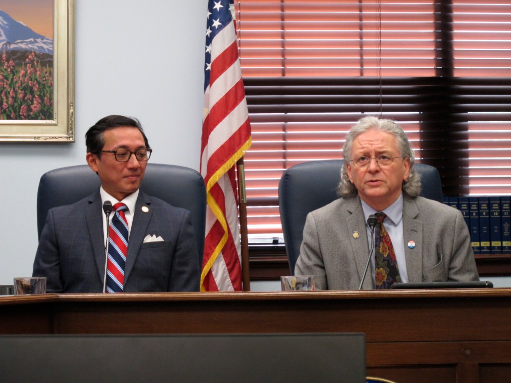 Alaska Senate Minority Leader Tom Begich, right, an Anchorage Democrat, speaks to reporters during a media availability, Monday, July 29, 2019, in Juneau, Alaska. Also shown is Sen. Scott Kawasaki.