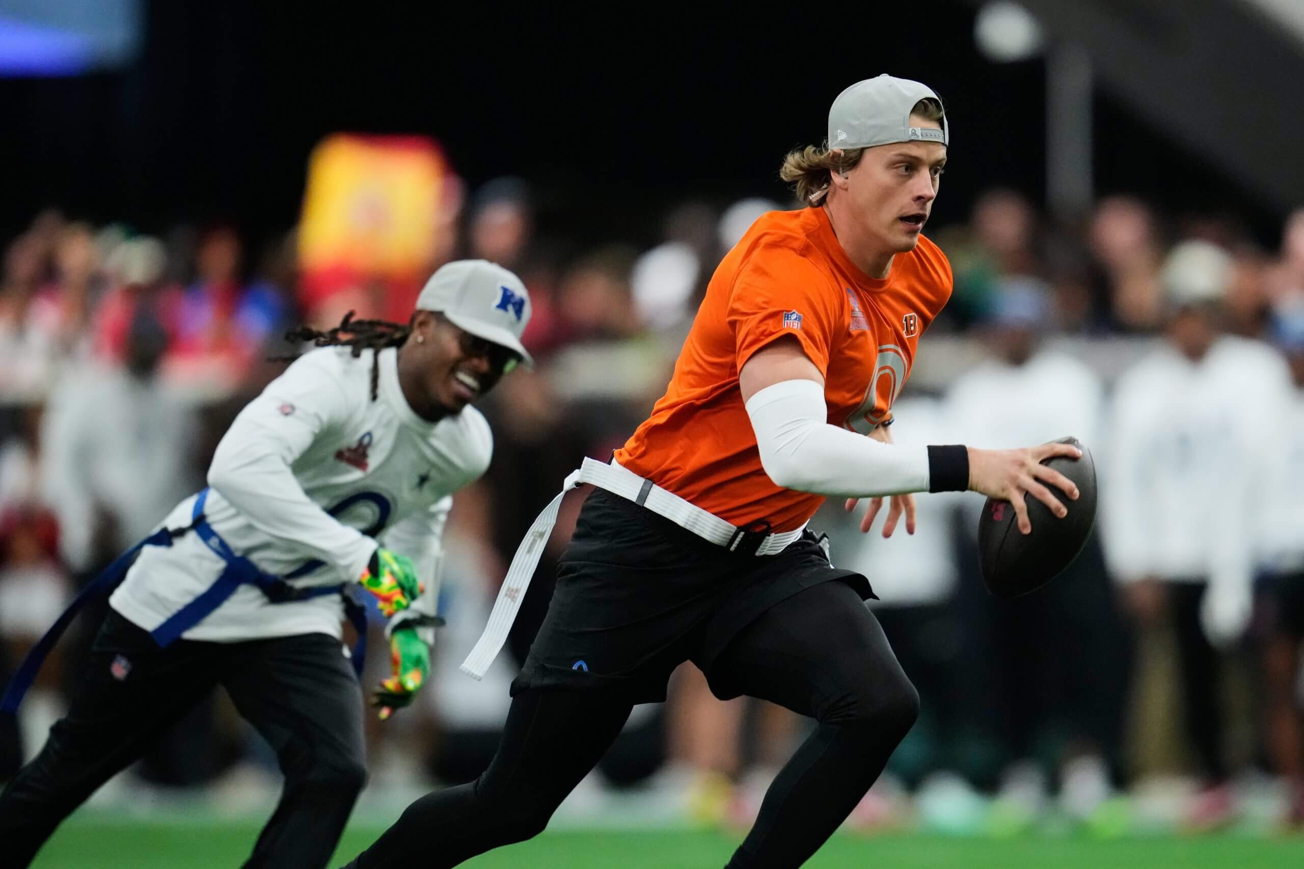 AFC quarterback Joe Burrow (9), of the Cincinnati Bengals, runs for a touchdown against the NFC during the first half of the NFL Pro Bowl football game, Tuesday, Feb. 3, 2026, in San Francisco. 