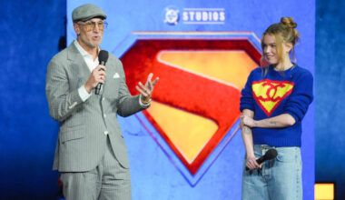Director Craig Gillespie, left, and cast member Millie Alcock of the upcoming film "Supergirl" speak during the Warner Bros. presentation at CinemaCon on Tuesday, April 14, 2026, at Caesars Palace in Las Vegas. (AP Photo/Chris Pizzello)