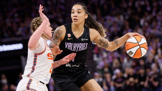 Golden State Valkyries forward Gabby Williams (1) controls the ball against Connecticut Sun guard Hailey van Lith (2) in the third quarter of a WNBA game at Chase Center in San Francisco, Monday, May 25, 2026. (Santiago Mejia/San Francisco Chronicle via AP)